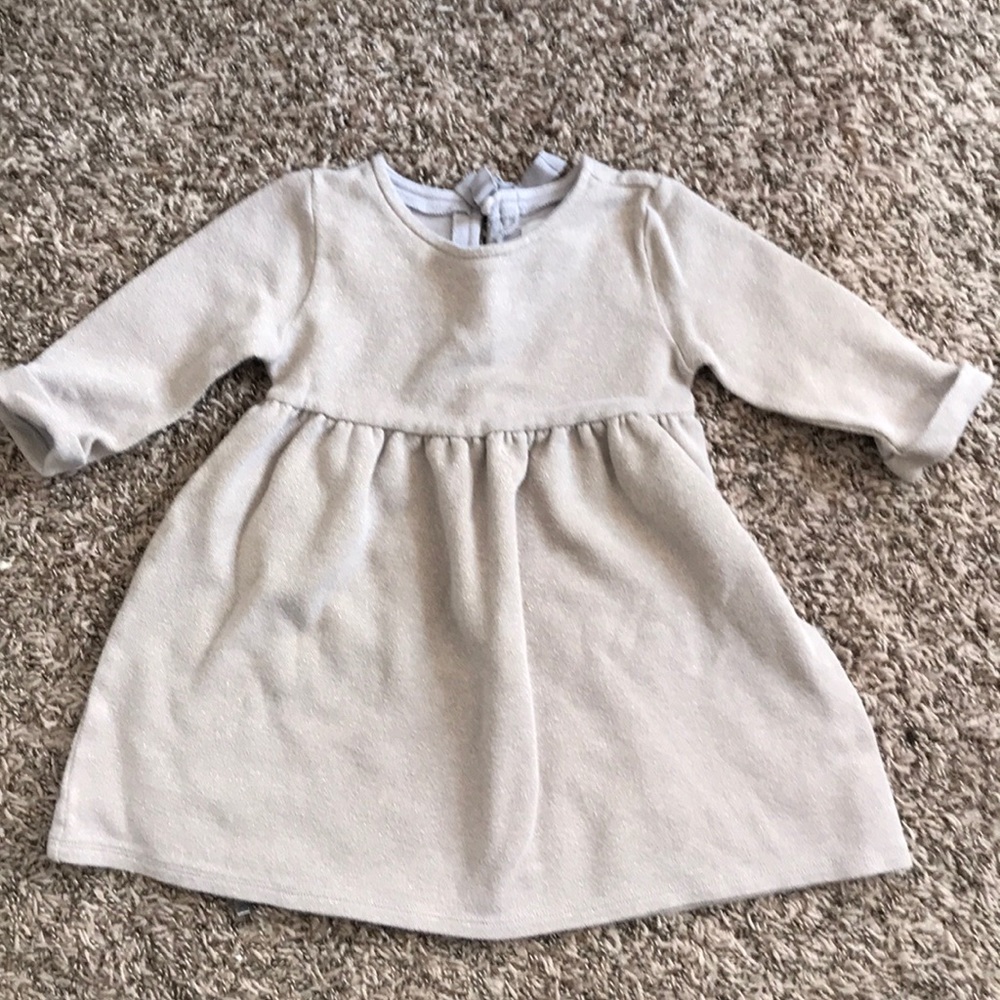 Girls tan dress with shimmery socks of gold